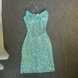 Sequin party dress. Blue sequin tight homecoming dress. Form fitting open back.